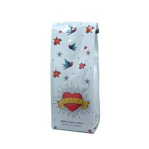 Front View of Bag – Love Tattoo. Our coffee gift is freshly roasted in small batches.
