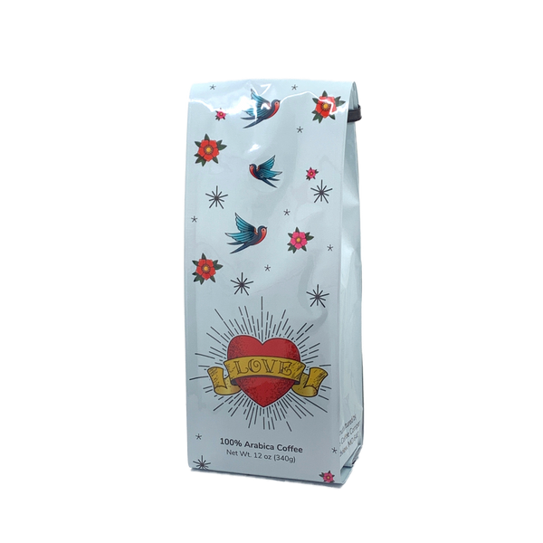 Front View of Bag – Love Tattoo. Our coffee gift is freshly roasted in small batches.