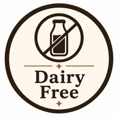 A circular 'Dairy Free' label featuring a dark brown icon of a milk bottle crossed out with a diagonal line, on a cream-colored background with a dark brown border.