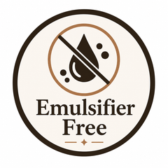 A circular 'Emulsifier Free' label with a dark brown and tan design on a white background.