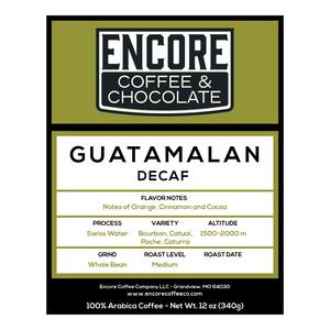 Encore Coffee & Chocolate Guatemalan Decaf coffee label featuring flavor notes of orange, cinnamon, and cocoa, with Swiss Water process.