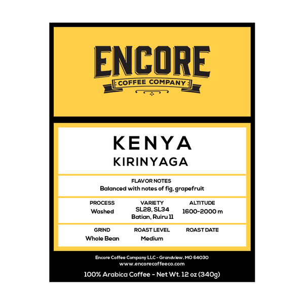 The image is a product label for Kenya Estate Peaberry coffee. The top of the label features a yellow banner with the Encore logo. The bottom half of the label contains information about the coffee, including its name, "Kenya Estate Peaberry," and additional text describing its flavor profile and origin. 