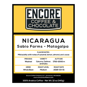 Encore Coffee & Chocolate Nicaragua Sabio Farms Matagalpa coffee label showing caramel, lemon, almond, and cocoa flavor notes, medium roast, washed process.