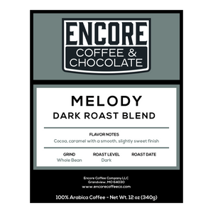Encore Coffee & Chocolate Melody dark roast blend label featuring flavor notes of cocoa and caramel with a smooth, slightly sweet finish.