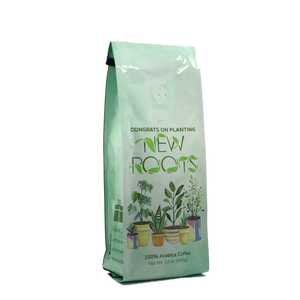Side View of Bag - Congrats on Planting New Roots. Our coffee gift is freshly roasted in small batches.