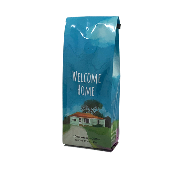 Front View of Bag - Welcome Home. Our coffee gift is freshly roasted in small batches.
