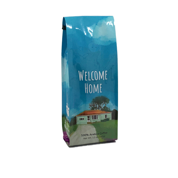 Side View of Bag - Welcome Home. Our coffee gift is freshly roasted in small batches.